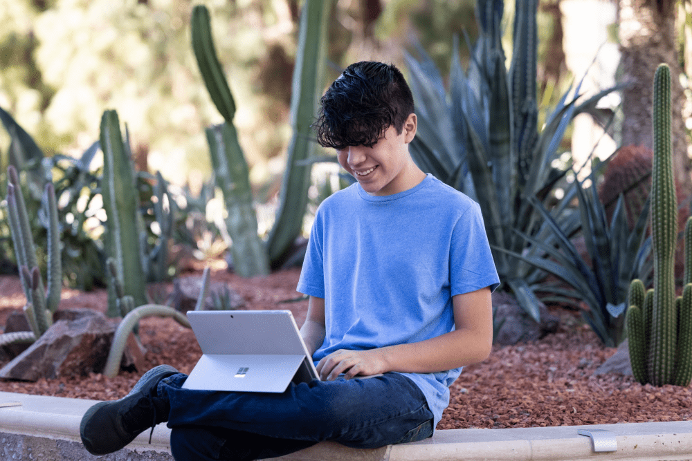 student reading a tablet