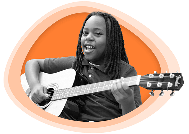 Student playing guitar