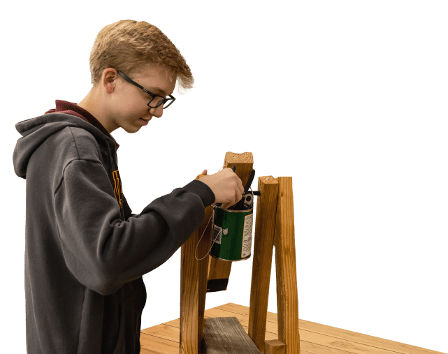 Student working on wood work