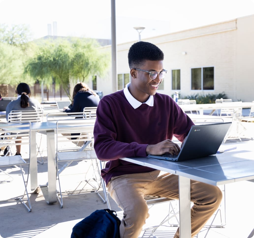 High schooler working on a computer at the ASU Prep Academy Polytechnic campus