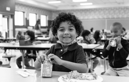 Child eating in lunchroom