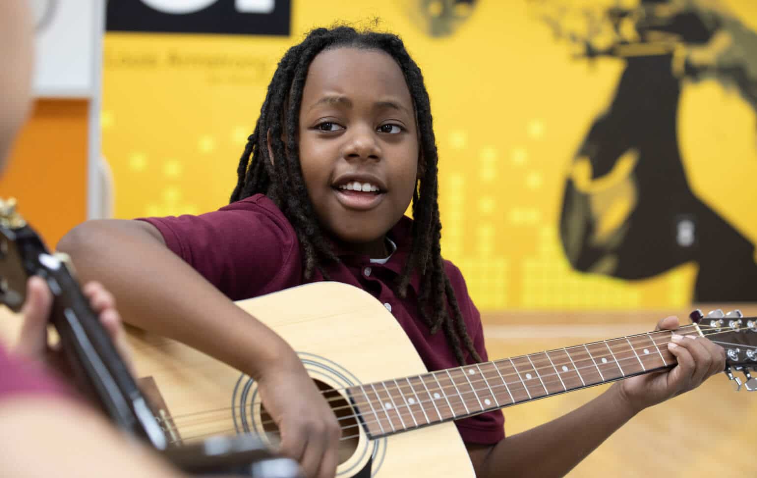 ASU Prep student playing guitar