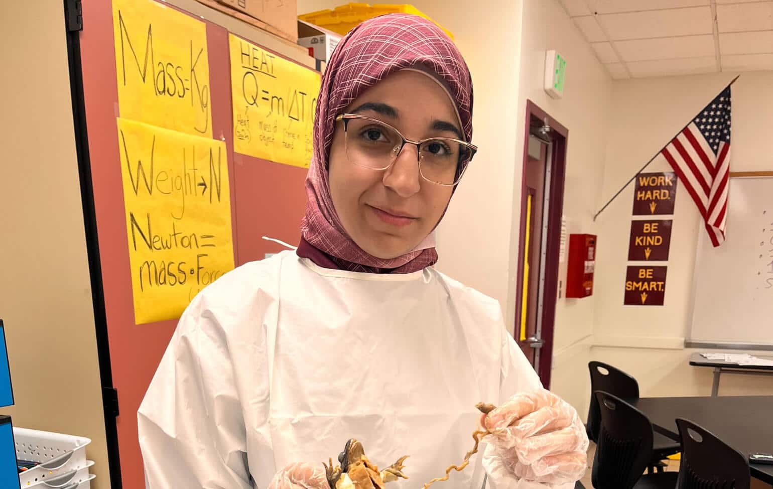 Mays Alqasemy dissecting a frog